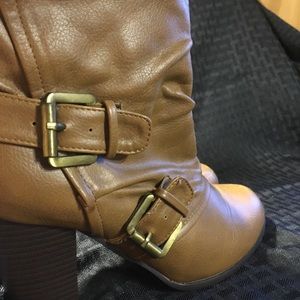 Tan buckle pioneer leather heels over ankle boots